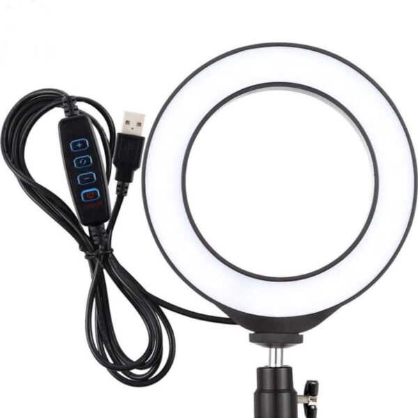 A circular LED ring light with a USB cable attached. The cable includes an inline control panel with buttons for power, brightness, and lighting modes. The ring light is mounted on an adjustable stand.
