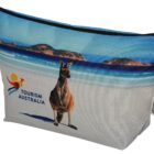 A zipper pouch featuring a printed image of a kangaroo on a beach against a backdrop of blue skies and hills. The pouch has the logo Tourism Australia with a stylized sun and wave design.