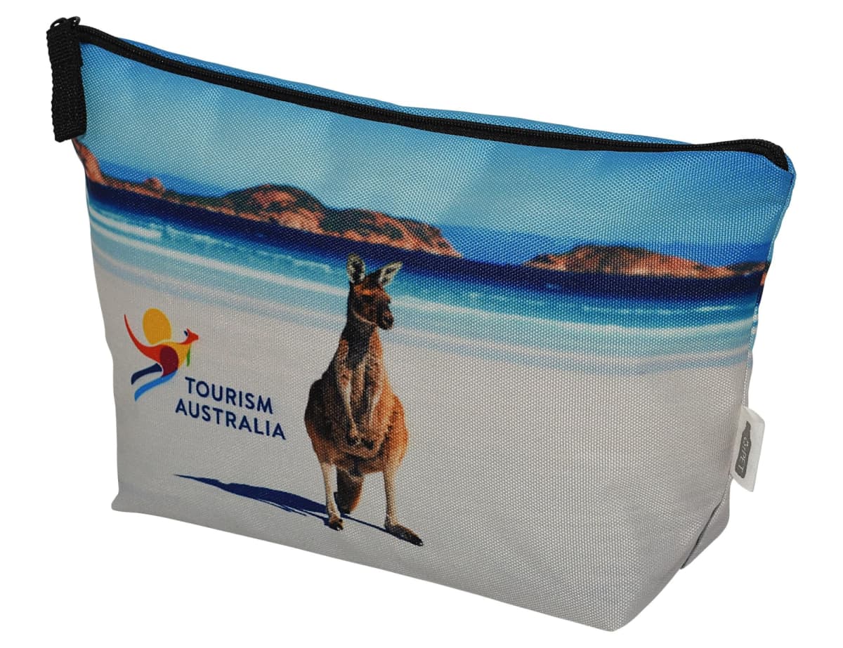 A zipper pouch featuring a printed image of a kangaroo on a beach against a backdrop of blue skies and hills. The pouch has the logo Tourism Australia with a stylized sun and wave design.