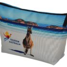 A canvas pouch featuring an image of a kangaroo on a beach, with blue skies and rocks in the background. The pouch displays the Tourism Australia logo, which includes a stylized kangaroo and sun.