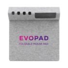 A gray foldable mouse pad with four circular slots and a rectangular slot at the top. The text EVOPAD FOLDABLE MOUSE PAD is printed in purple and pink on the front.