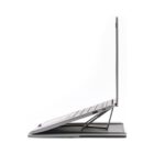 Side view of a slim silver laptop with a detachable keyboard, propped up on its stand. The laptops screen is open, displaying its sleek and minimalist design against a white background.