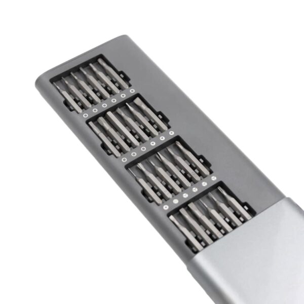 Close-up of a metallic tool with rows of parallel, sharp blades contained in a sleek, rectangular casing. The design appears modern and industrial, with precision-engineered details visible on the surface.