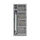 A neatly organized screwdriver set with a silver handle and various precision bits arranged in a compact, gray case.