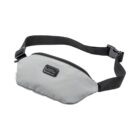 A gray waist pouch with a black adjustable strap and buckle. The pouch has a front zipper and a rectangular label on its front.