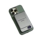 A smartphone with a green case is attached to a Powerwave 5000 portable charger. The charger has a digital display showing 100%.