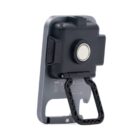 A black VR headset with a sturdy, adjustable strap and a gray backing. The design is sleek and compact, featuring a button and vent. The headset is in an upright, angled position against a plain white background.