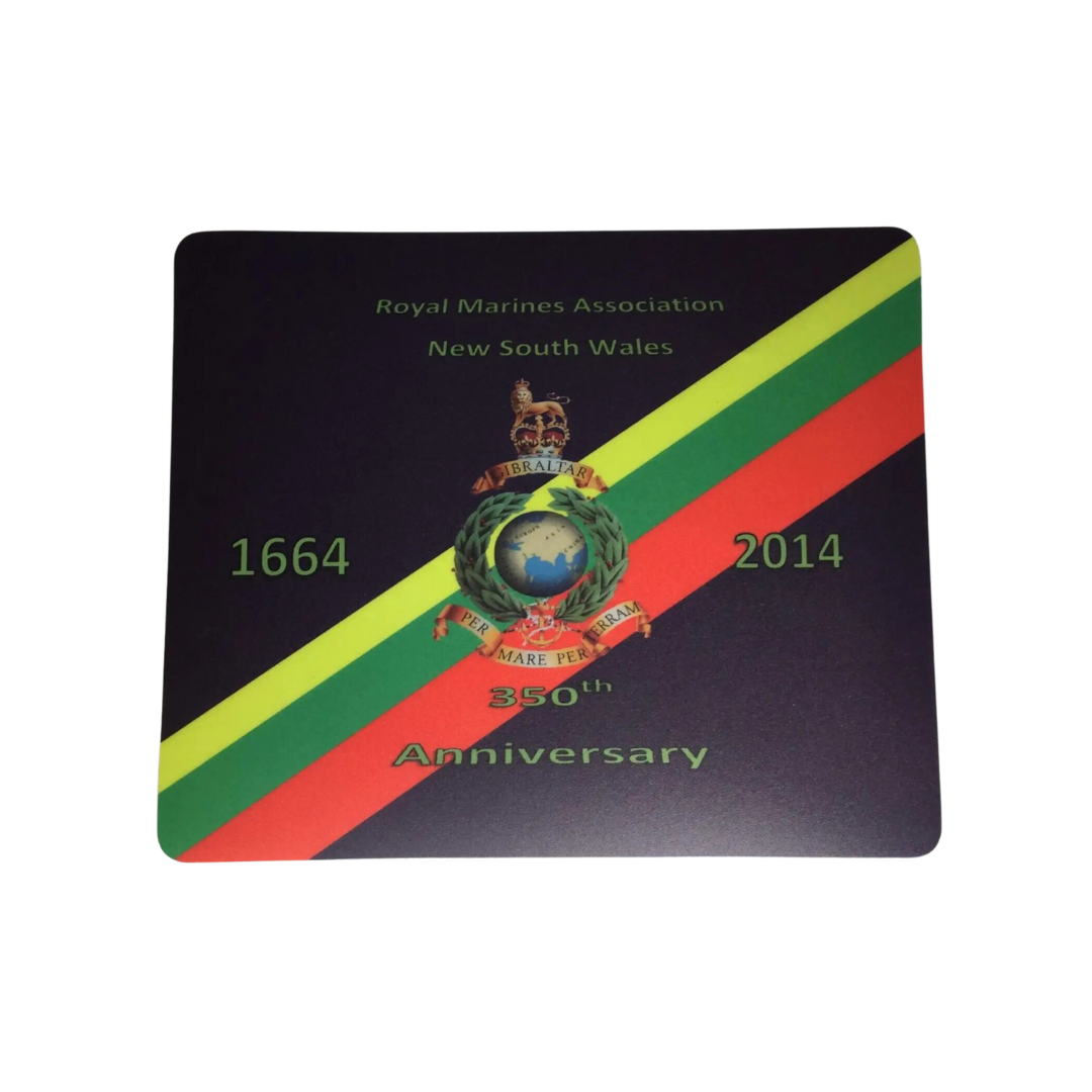 The Budget Custom Branded Ultra Light mouse pad displays the Royal Marines Association New South Wales logo with 1664 - 2014, 350th Anniversary text. It features red, green, and yellow diagonal stripes on a dark background.