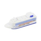 A miniature model of a white cruise ship with blue and orange accents. The ship has a streamlined design with windows along the side and a blue logo on the upper section.