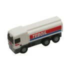 A small toy tanker truck with white and gray coloring, featuring the name TEBOIL on its side in red and blue. The toy has three wheels on each side and simplistic details representing a truck.