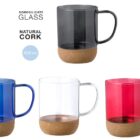 Four glass mugs with cork bases in black, blue, clear, and red colors, 450 ml capacity.