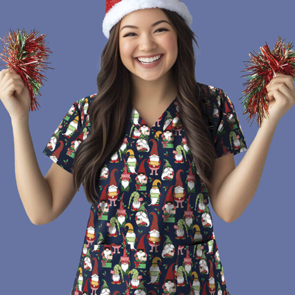 A person smiles while wearing a festive reindeer antler headband and holding tinsel pom-poms. They are dressed in a colorful shirt with holiday-themed patterns featuring gnomes, against a plain blue background.