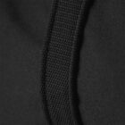Close-up of a black fabric with a textured strap running vertically. The fabric appears durable and the weaving pattern of the strap is clearly visible, showcasing fine details in the stitching.