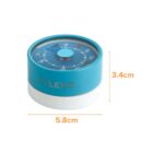 A blue and white Flexo timer with a circular design and a knob on top. The timer face shows numbers and symbols. Dimensions are marked: 5.8 cm in width and 3.4 cm in height.