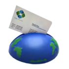 A business card displaying the name Steph Hsu is inserted into a globe-shaped card holder with blue oceans and green continents. The card includes contact details and a logo with green and blue shapes.