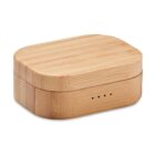 A small, rectangular bamboo box with rounded edges and a smooth finish. It features a lid with four small holes on the front side, suggesting a slot or vent design. The wood grain is visible, highlighting its natural texture.