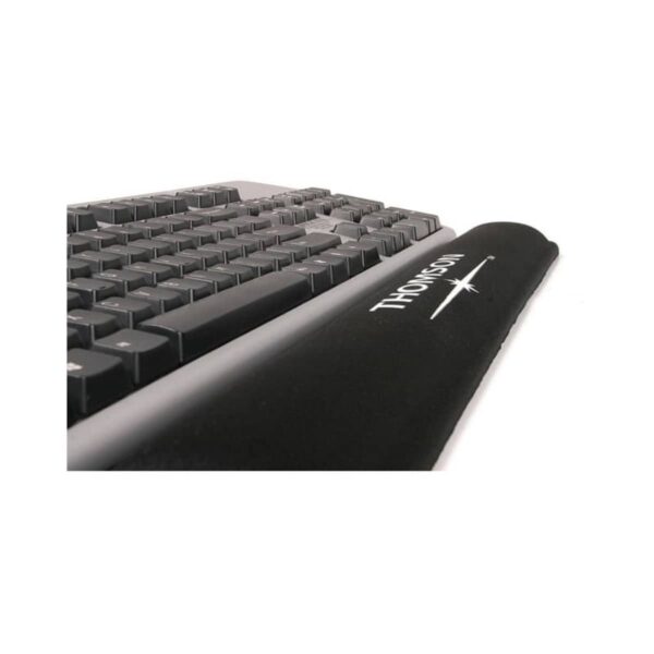 A close-up view of a computer keyboard with black keys and a branded wrist rest placed in front of it. The wrist rest is black with white text. The focus is on the lower right side of the keyboard.
