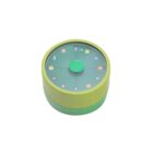 Green round container with a clear lid, featuring colorful icons arranged in a circle and a central green button.