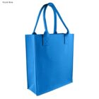 A royal blue reusable tote bag with two handles is standing upright against a white background.