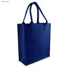Navy blue tote bag with two handles, standing upright. The bag has a simple design with a solid color and visible stitching at the handle base.