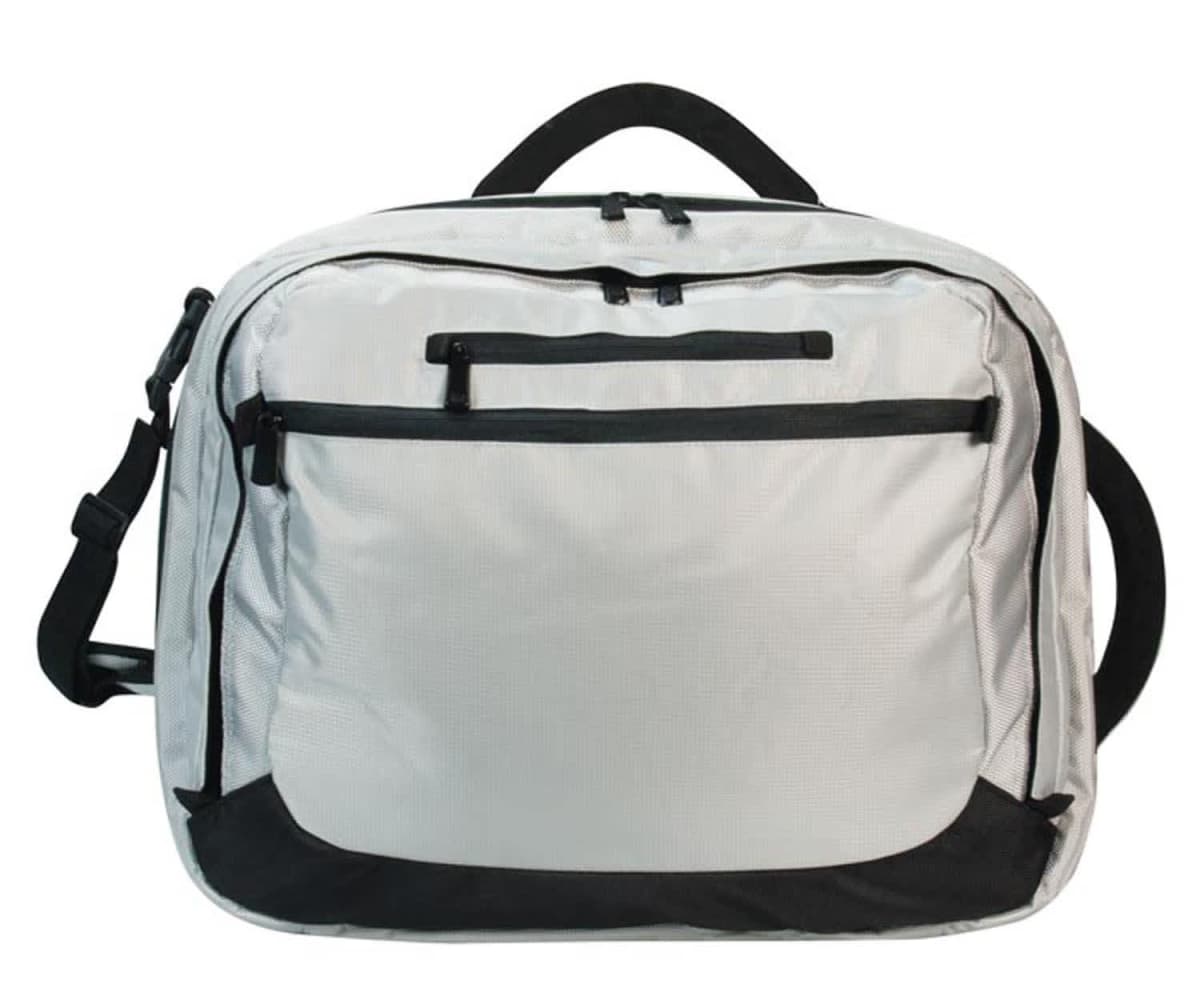 A gray backpack with black zippers and accents is shown. It has a large front pocket, a handle on top, and an adjustable shoulder strap. The backpacks design is simple and functional.