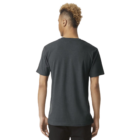 Person in a Gildan Softstyle T-shirt and black pants, back facing the camera.