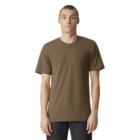 Man in Gildan Softstyle T-shirt and jeans, standing against white background.