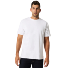 Man in a Gildan Softstyle Adult T-Shirt and dark jeans against a white background.