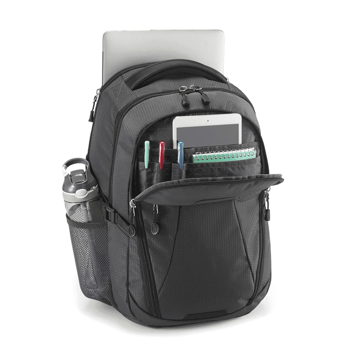 A black backpack with multiple compartments, holding a laptop and a tablet. The front pocket is open, displaying pens and a notebook. A water bottle is in the side mesh pocket.