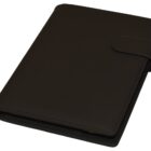 A black leather-bound notebook with a strap closure lies closed. Its clean and professional design suggests it may be used for journaling or business purposes.