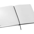 An open notebook with dotted pages and a black ribbon bookmark. The notebook has a black cover, and the pages are blank, inviting for sketches or notes.