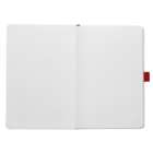 An open blank notebook with white pages and a red bookmark. The edges of the pages are visible, and there is a red elastic band visible on the right side.