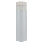 A sleek, silver insulated travel mug with a light-colored lid and a secure flip-top closure. The simple and slender design makes it ideal for carrying beverages on the go.