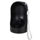 A black portable urinal with a white carrying strap, featuring an ergonomically shaped opening and a detachable lid with a small spout.