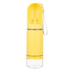 Yellow water bottle with an attached cup and a clear base. It has a loop handle for carrying. The bottle is designed for pets, featuring a spout that blends into the container seamlessly.