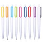 A row of nine white pens with colored clips in a variety of hues, including yellow, orange, blue, green, pink, red, and purple, on a plain white background. The pens are evenly spaced and aligned vertically.