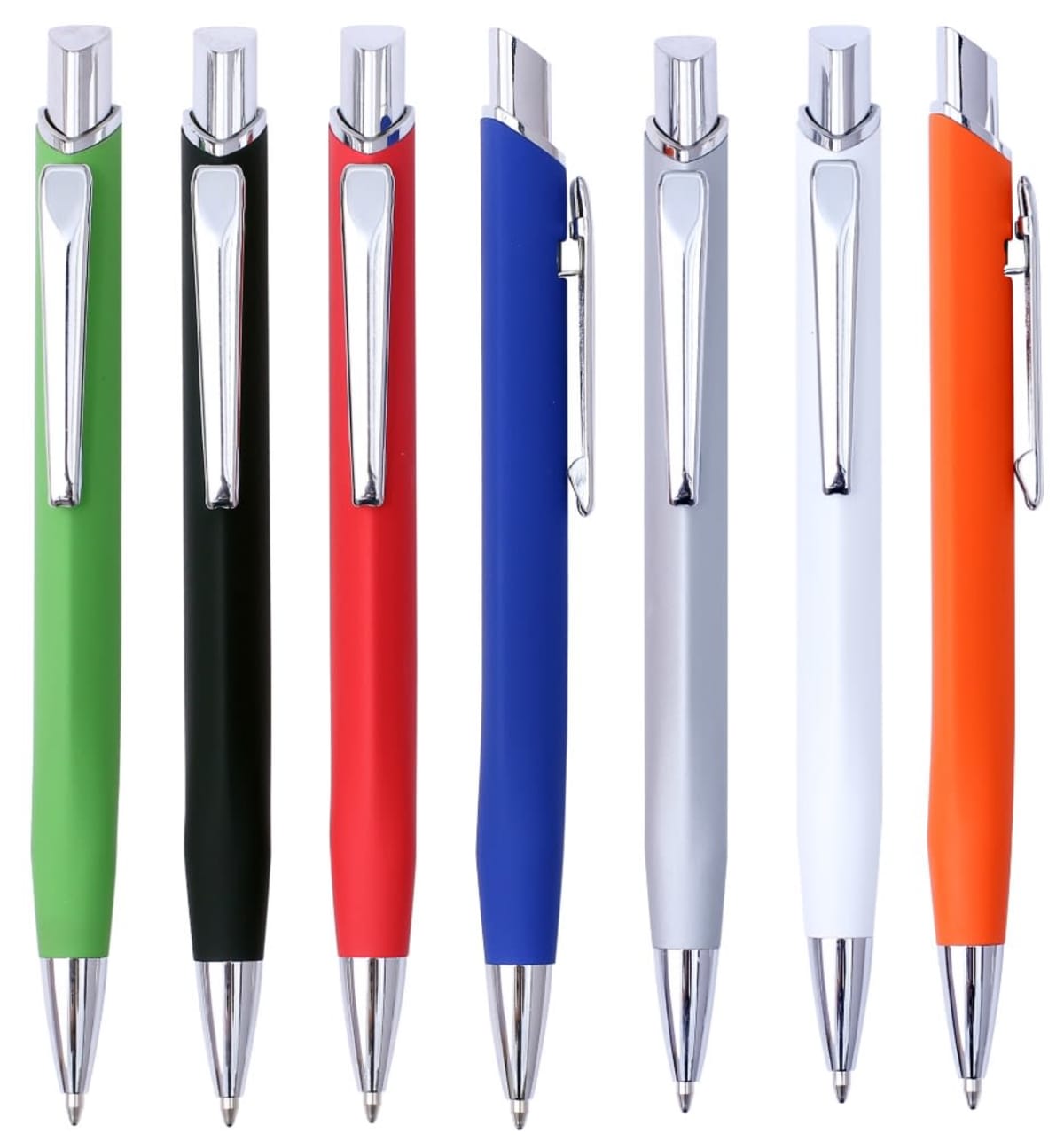 Seven ballpoint pens standing upright in a row. The pens have shiny silver tips and clips, with bodies in various colors: green, black, red, blue, gray, white, and orange.