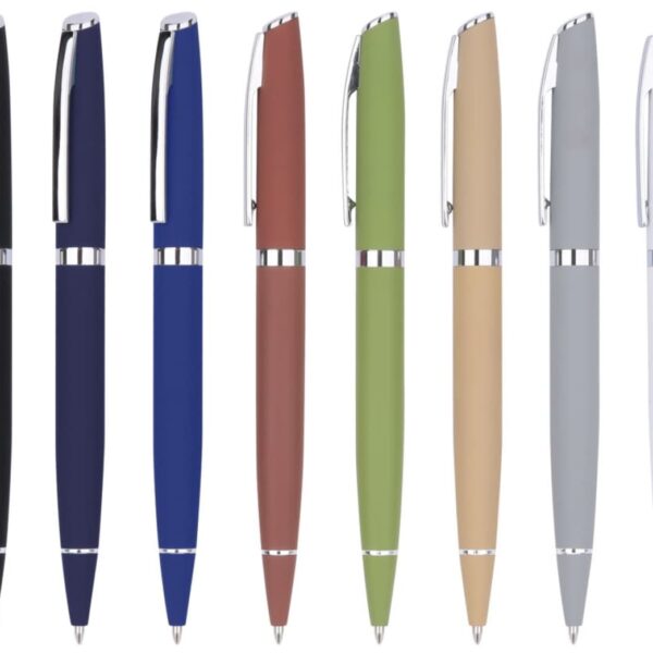 A row of eight ballpoint pens with silver clips and tips. From left to right, the pen colors are black, dark blue, blue, red, green, beige, gray, and white. Each pen stands upright against a white background.