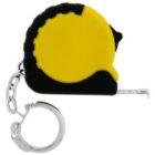 A small yellow and black tape measure attached to a silver keychain. The tape measure blade is partially extended, showing measurement markings.