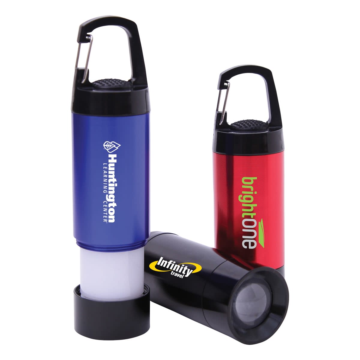 Three colorful carabiner flashlights: one blue with Hurrington Learning Center text, standing upright; one red with Brightone text, also upright; and one black with Infinity Brand text, lying horizontally.