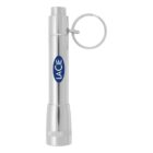 Silver keychain flashlight with a cylindrical shape and a ring attached near the top. The body has a blue oval logo with the word LACIE in white letters.