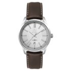 A wristwatch with a silver dial, black hour markers, and a date display at 6 oclock. It has a stainless steel case and a brown leather strap with white stitching.