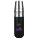 A stainless steel travel flask featuring a logo with the text Outback Odyssey Travel Agency, and an illustration of a landscape with stars. The flask has a silver cap and a black body.