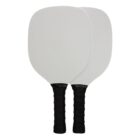 Two white pickleball paddles with black grips are positioned side by side. The paddles have a simple, unadorned appearance, highlighting their sleek and functional design.