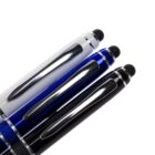 Close-up of three ballpoint pens with metallic clips, aligned side by side. The barrels are colored black, blue, and white. The pens feature stylus tips, adding a modern touch to their classic design.