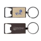 Two keychains with bottle openers are shown. The top one has a wooden panel labeled Aloha with a hibiscus flower design. The bottom one is metallic with the logo Heritage Brew. Both have split rings for attaching keys.