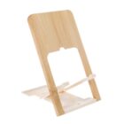 A wooden phone stand with a minimalist design, featuring a slanted backrest and a white base for support, is shown against a white background.