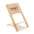 A wooden phone stand with a slot for holding a device. The stand features the logo and text Starlight Productions at the top, decorated with stars.