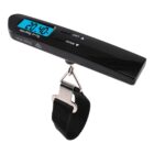 A digital luggage scale displaying a weight of 20.4 kg. It has a black handle with a backlit screen, buttons for unit selection, an on/tare function, and a strap with a metal clasp. The scales maximum capacity is 50 kg.