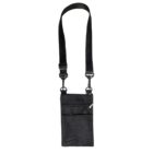 A black crossbody bag with an adjustable strap. The bag features a front zipper pocket and a small mesh section.